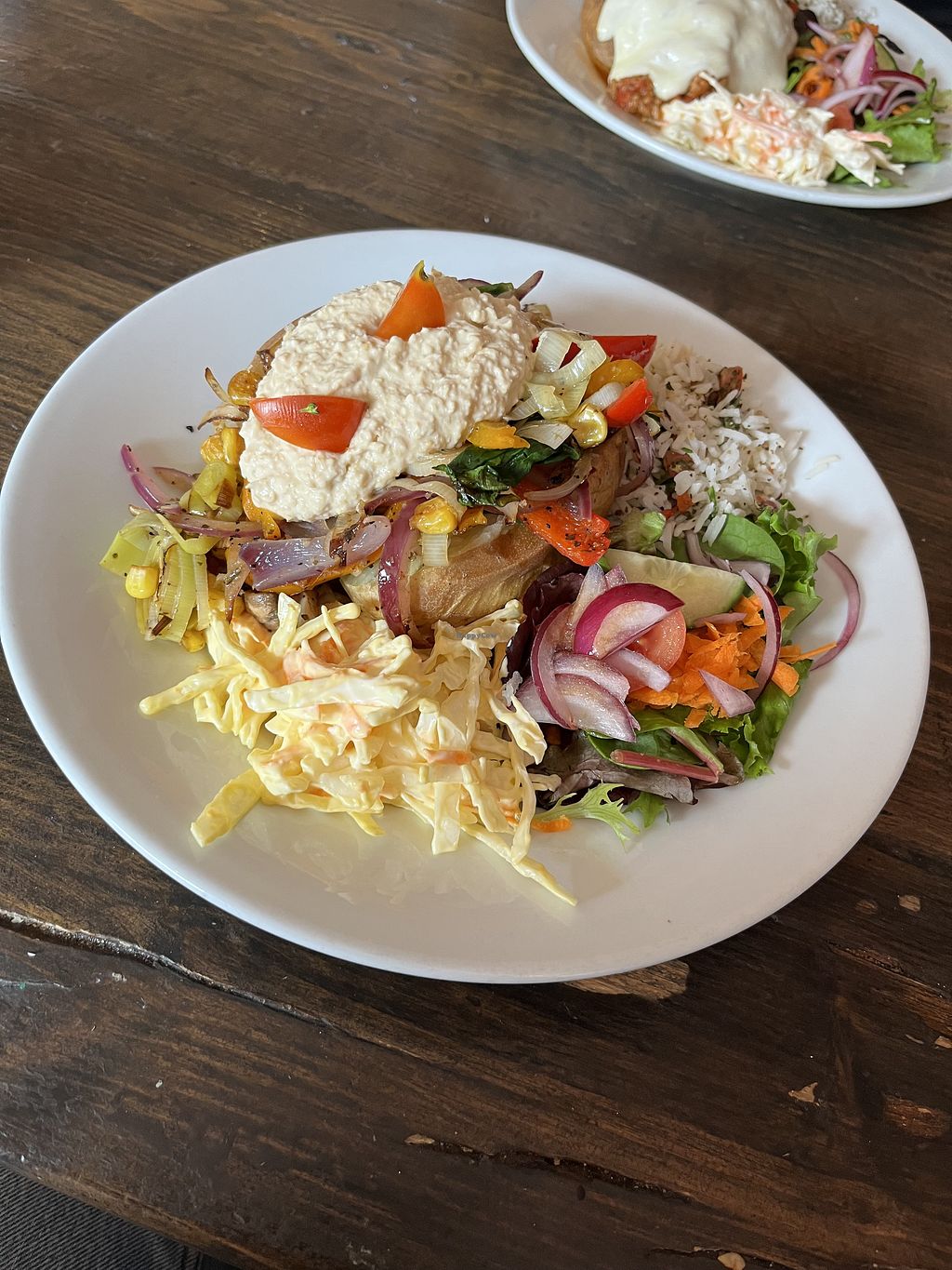 Vegan platter with hummus and salad at Mojos